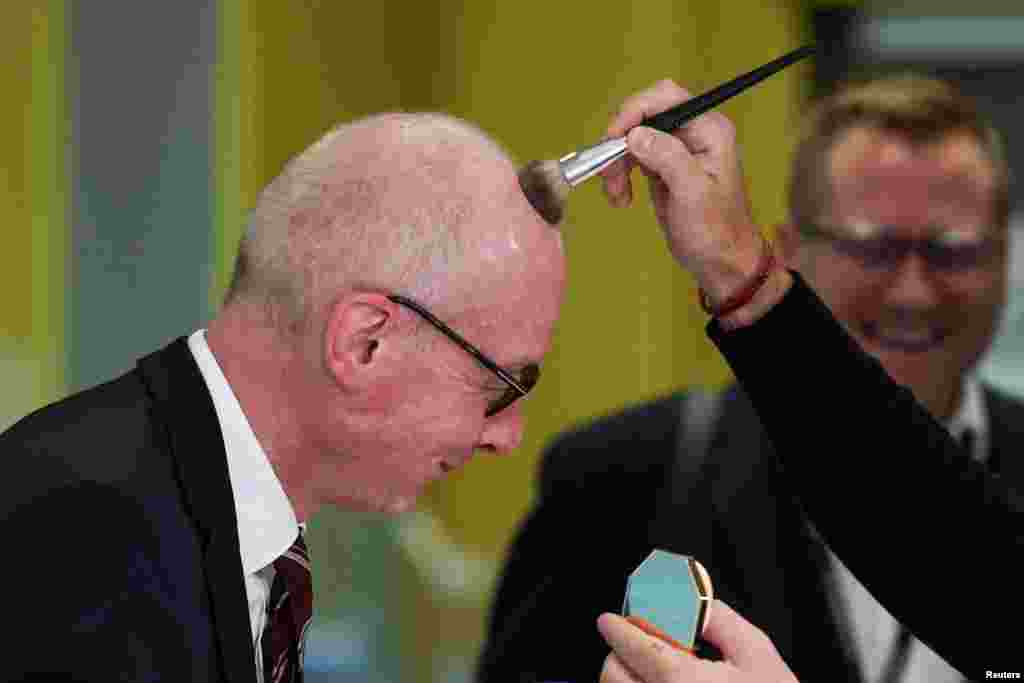 British MP Pat McFadden prepares to attend an interview at Britain's Labour Party's annual conference in Liverpool, Britain.