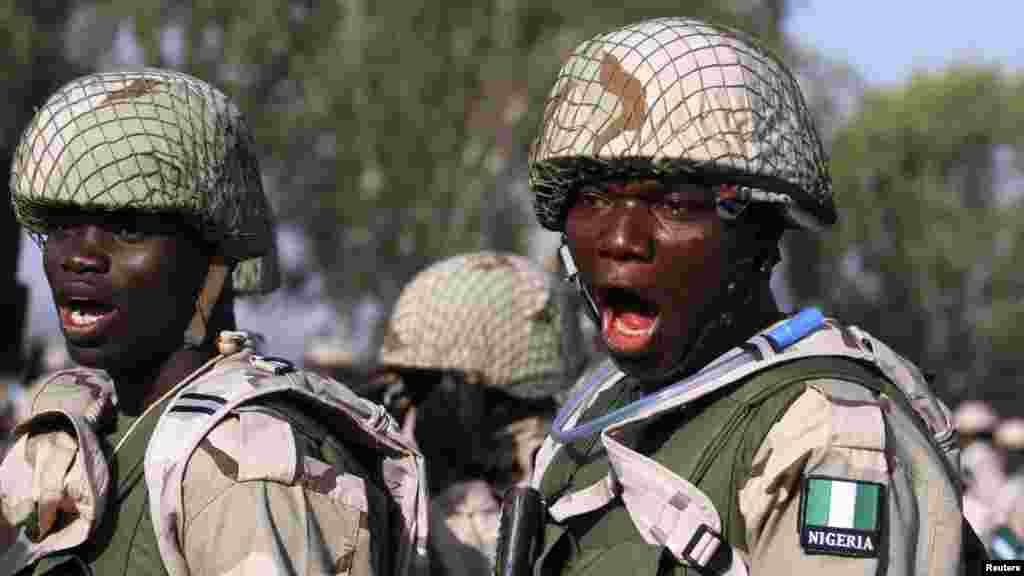 Nigerian soldiers gather during preparations for their deployment to Mali, at the army's peacekeeping centre in Kaduna.