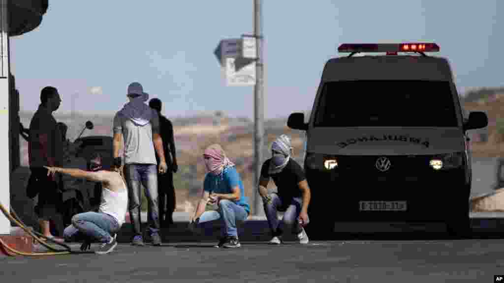 Zanga-zanga da Falasdinawa da Ramallah, West Bank, 25 Yuli 2014. 