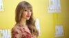 Taylor Swift arrives at the 46th Annual Country Music Awards at the Bridgestone Arena on Thursday, Nov. 1, 2012, in Nashville, Tennessee.