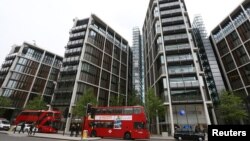FILE - Luxury apartment complex One Hyde Park is seen London, May 2, 2014. Anti-corruption campaigners see it as a landmark to Britain’s hypocritical role in offshore finance.