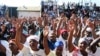 FILE: MDC supporters at a rally in Bulawayo … Human rights monitors warned of an upsurge in political violence in Zimbabwe ahead of a proposed election in 2011.