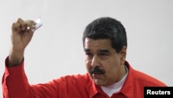 Nicolas Maduro vote à Caracas, Venezuela, le 30 juillet 2017. (Miraflores Palace/Handout via REUTERS)