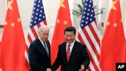 2013年12月4日，中国国家主席习近平与时任美国副总统拜登在北京人民大会堂会面。（美联社照片）