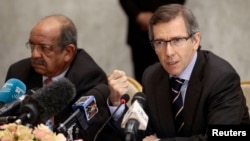 FILE - Bernardino Leon, right, the U.N. special envoy for a Libya, addresses Libyan political leaders and rivals in Algiers, March 10, 2015.