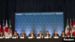 The twelve Trans-Pacific Partnership (TPP) Ministers hold a press conference to discuss progress in the negotiations in Lahaina, Maui, Hawaii July 31, 2015.