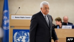 Presiden Palestina Mahmud Abbas menyampaikan pidato di hadapan Dewan Hak Asasi PBB di Jenewa, Swiss, 27 Februari 2017. (AFP PHOTO / Fabrice COFFRINI) 