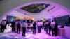 People visit Huawei's booth at an exhibition during the World Intelligence Congress in Tianjin, China, May 16, 2019. 