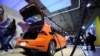 FILE - A Volkswagen E-Golf electric vehicle is seen at the Canadian International Auto Show in Toronto, Canada, Feb. 18, 2020.