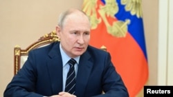 El presidente ruso, Vladimir Putin, preside una reunión con miembros del Consejo de Seguridad, a través de un enlace de video en Moscú, Rusia, el 14 de julio de 2023.