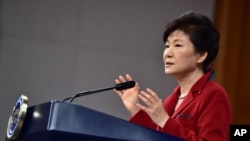 FILE - South Korean President Park Geun-hye is delaying her U.S. trip "to concentrate on the response to the MERS outbreak,” a statement from her office said.