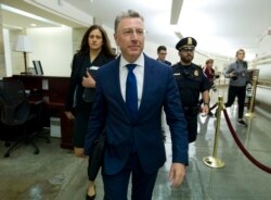 FILE - Kurt Volker, a former special envoy to Ukraine, leaves after a closed-door interview with House investigators at the Capitol in Washington, Oct. 3, 2019.