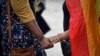 FILE - Activists commiserate in Nairobi on May 24, 2019, after the Kenyan High Court upheld laws criminalizing same-sex relations. Reactions in Africa to U.S. President Donald Trump's Jan. 20, 2025, executive orders regarding LGBTQ people ranged from "excited" to defiant.