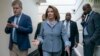 FILE - House Speaker Nancy Pelosi, D-California, walks to a Democratic Caucus meeting at the Capitol in Washington, March 26, 2019. 