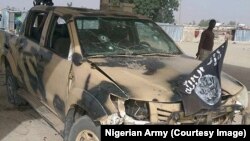 Un véhicule abandonné appartenant à Boko Haram à Dikwa, dans l'Etat de Borno, au Nigeria, le 24 février 2016. 
