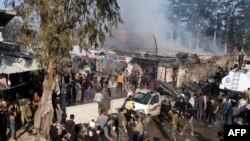 A handout picture released by the Syrian Civil Defense rescue workers shows the scene of a fuel truck explosion which killed 36 people including at least six Turkey-backed rebel fighters April 28, 2020, in the northern Syrian city of Afrin.