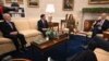 US President Joe Biden (R) and Vice President Kamala Harris (3rd L) meet with House Speaker Mike Johnson (2nd L) and Senate Minority Leader Mitch McConnell (L) in the Oval Office of the White House in Washington, DC on February 27, 2024.