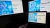 Соціальна мережа X, раніше відома як Twitter, на моніторах комп'ютерів і ноутбука, 24 липня 2023 року. Фото: AP/Darko Vojinovic, File