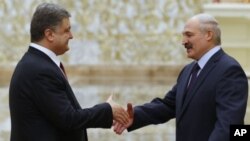 Петро Порошенко і Олександр Лукашенко