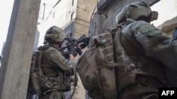 以軍2024年1月22日發佈的照片顯示以色列士兵在加沙與哈馬斯作戰。