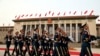 FILE - Members of the Chinese military march as President Donald Trump and Chinese President Xi Jinping participate in a welcome ceremony at the Great Hall of the People, Nov. 9, 2017, in Beijing, China.