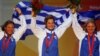 FILE - From L to R: Sofia Bekatorou, Sofia Papadopoulou and Virginia Kravarioti of Greece celebrate with their bronze medals after the medal race in the Yingling class competition during the Beijing 2008 Olympic Games in Qingdao, Aug. 17, 2008. 