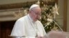 This handout photo taken on December 25, 2020, and released by the Vatican press office, the Vatican Media, shows Pope Francis delivering his live-streamed Urbi et Orbi blessing from the Vatican Blessing hall. (Photo by Handout / VATICAN MEDIA / AFP…