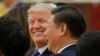 Le président américain Donald Trump et son homologue chinois Xi Jinping lors d’un dîner d'État au Grand Palais du Peuple à Beijing, Chine, 9 novembre 2017. 