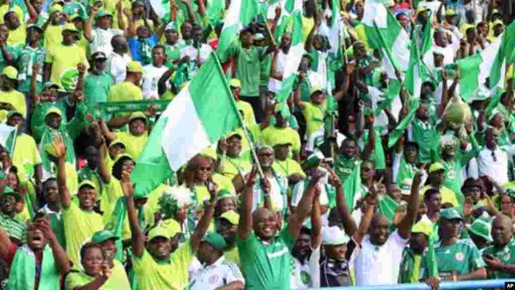 Nigeria's supporters cheer during a world cup qualifying playoff match in Calabar, Nigeria, Saturday, Nov. 16, 2013.