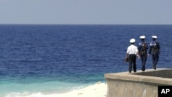 Vietnamese navy personnel patrol on Truong Sa islands or Spratly islands in this April 13, 2010 picture.