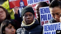 Manifestación a favor de los inmigrantes haitianos en Nueva York: una demanda alega que hubo discriminación racial en la decisión de quitarles el TPS a los haitianos.