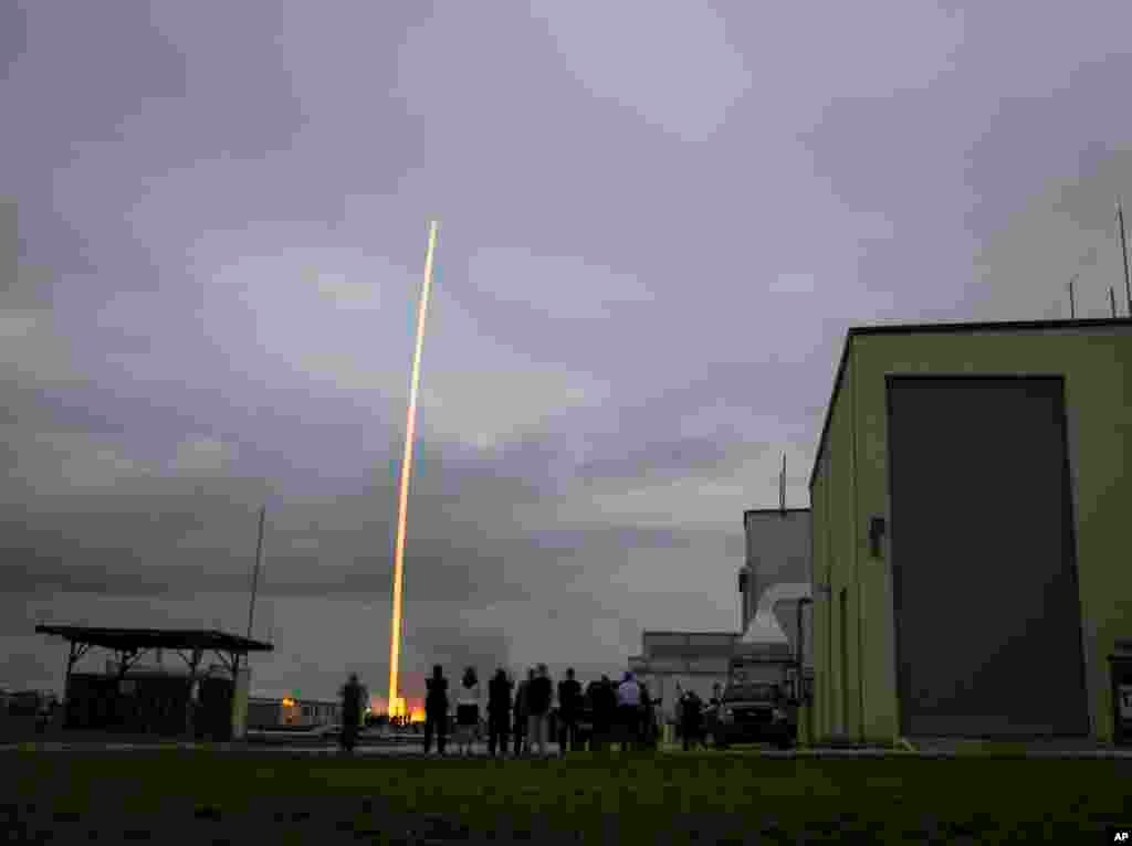 In this photo provided by NASA, the United Launch Alliance Delta 4-Heavy rocket, with NASA’s Orion spacecraft mounted atop, lifts off from the Cape Canaveral Air Force Station, Friday, Dec. 5, 2014.