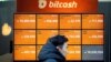 Bitcoin Plunges Below $12,000, Heads for Worst Week Since 2013