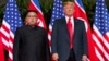 FILE - U.S. President Donald Trump, right, meets with North Korean leader Kim Jong Un on Sentosa Island, in Singapore, June. 12, 2018. 