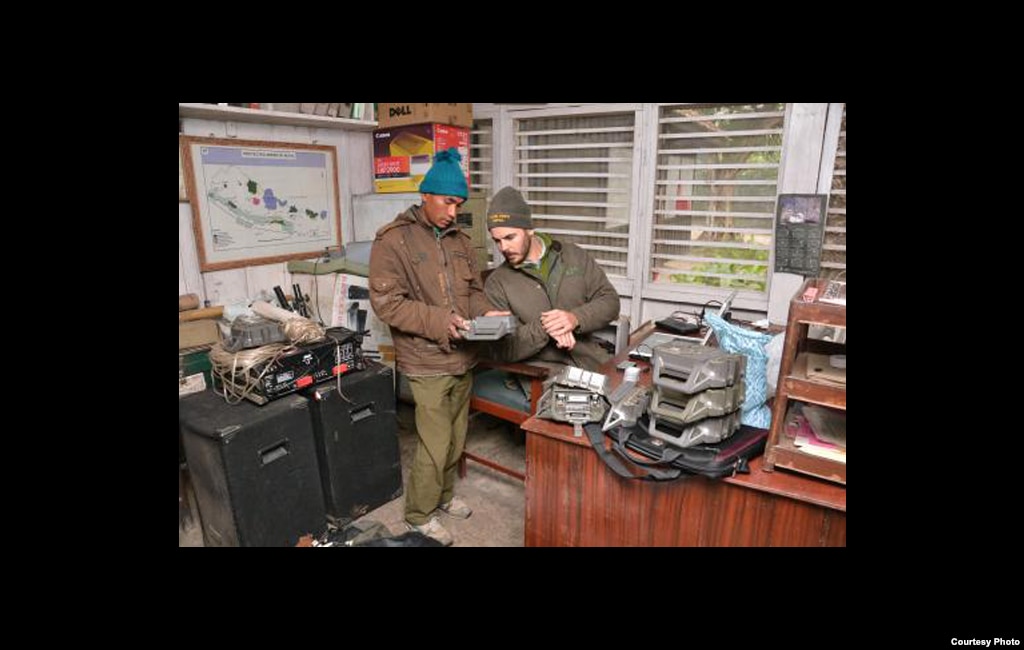 Michigan State University PhD student Neil Carter readies equipment for field work to study human tiger interaction. Credit: Center for Systems Integration and Sustainability, Michigan State University