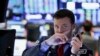 Dow Jones cierra al alza en turbulento día