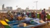 Fishing boat are parked along the Mekong riverbank on the evening of Oct. 14, 2019 in Phnom Penh, Cambodia. (Malis Tum/VOA Khmer)