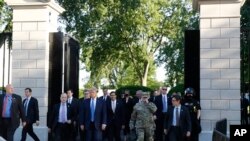 President Donald Trump walks from the gates of the White House to visit St. John's Church across Lafayette Park Monday, June 1, 2020, in Washington.