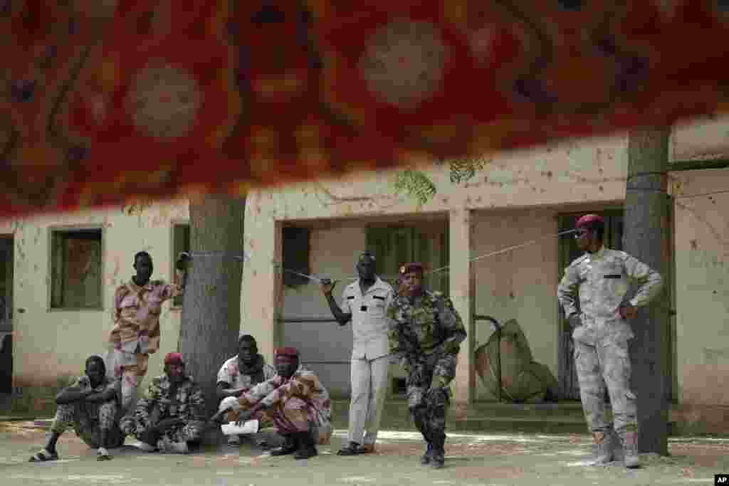 Chadian troops watch the closing ceremony of operation Flintlock at an army base in N'djamena, Chad, March 9, 2015. 