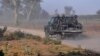 FILE - Members of the Cameroonian Rapid Intervention Force patrol on the outskirt of Mosogo in the Far North region of the country where Boko Haram jihadist have been active since 2013, March 21, 2019.
