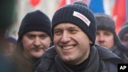 Pemimpin oposisi Rusia Alexei Navalny menghadiri pawai untuk mengenang pemimpin oposisi Boris Nemtsov, di Moscow, 25 Februari 2018. 