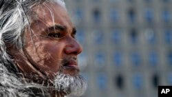 Ravi Ragbir, executive director of the New Sanctuary Coalition, arrives for his annual check-in with Immigration and Customs Enforcement, March 9, 2017, in New York. The Trinidadian immigrant works with an interfaith network of congregations and activists seeking to protect New York's immigrant families from detention and deportation. He was convicted of wire fraud in 2001 and served his sentence but fears he will now be deported.