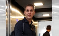 Szabolcs Dull, editor-in-chief of Hungary's main independent website Index, leaves the newsroom after being sacked in Budapest, July 22, 2020.