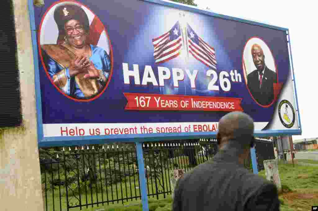 An Ebola public awareness campaign utilitzes a billboard with the face of Liberia President Ellen Johnson Sirleaf, Monrovia, Liberia, July 31, 2014. 