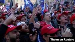 Ciudadanos participan en una manifestación en apoyo al presidente de Estados Unidos, Donald Trump, en Washington DC, el pasado 14 de septiembre.