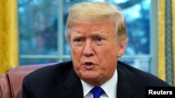 Predsednik Donald Tramp u ekskluzivnom intervjuu za Rojters u Ovalnoj kancelariji Bele kuće 11. decembra 2018. 