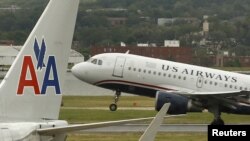 Merger American Airlines-US Airways menciptakan maskapai penerbangan terbesar di dunia, Rabu (13/2). (Foto: dok).