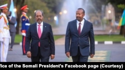 ፎቶ ፋይል፦ ጠቅላይ ሚኒስትር ዐቢይ አህመድ፣ ከሶማሊያ ፕሬዝደንት ሃሳን ሼክ ሞሃሙድ ጋር በአዲስ አበባ 