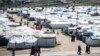 Women Reportedly Linked to IS Set Syria Camp on Fire