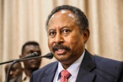 FILE - In this Aug. 21, 2019, file photo, Sudan's Prime Minister Abdalla Hamdok speaks at a news conference in Khartoum, Sudan.